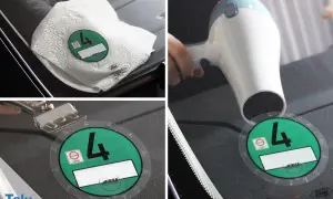 Umweltplakette entfernen: Föhn erwärmt die Scheibe, ein Schaber löst die Plakette.
